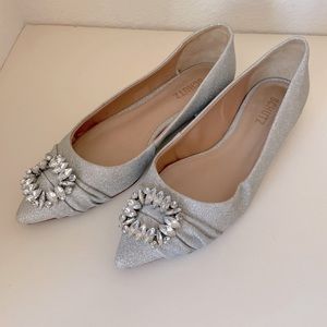 SCHUTZ Meisho Pointh Toe Flat in Shimmery Silver and Decorative Broach on front